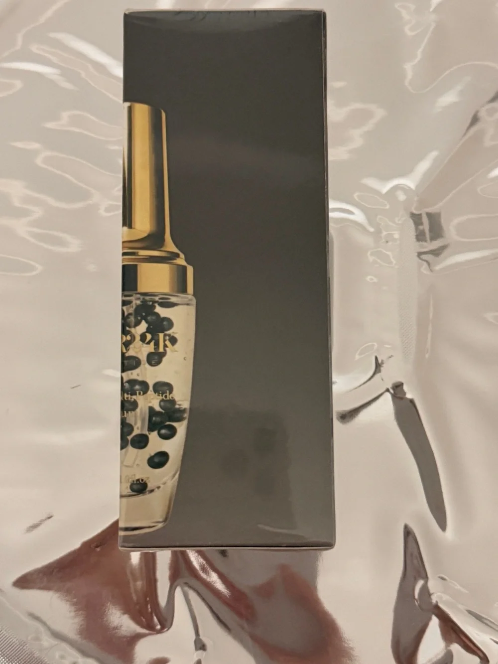 D'OR24K Prestige Black Multi Peptide Serum — Black & Gold